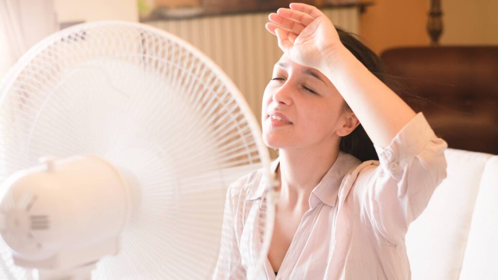 HVAC replacement Sugar Land technician installing new AC unit